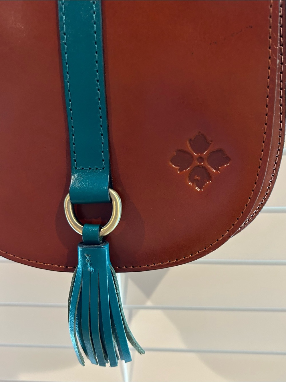 Patricia Nash Brown and Teal Leather Crossbody Saddle Bag